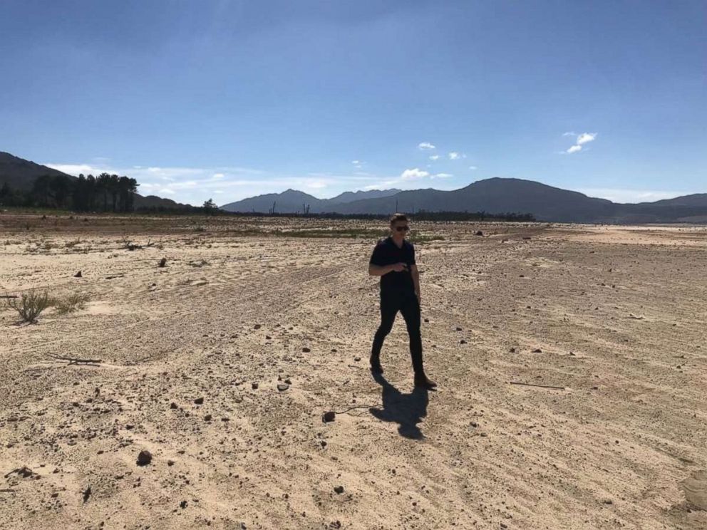 ABC's James Longman at the Theewaterskloof dam, which is only 12.5 percent full as of Feb. 2018. 