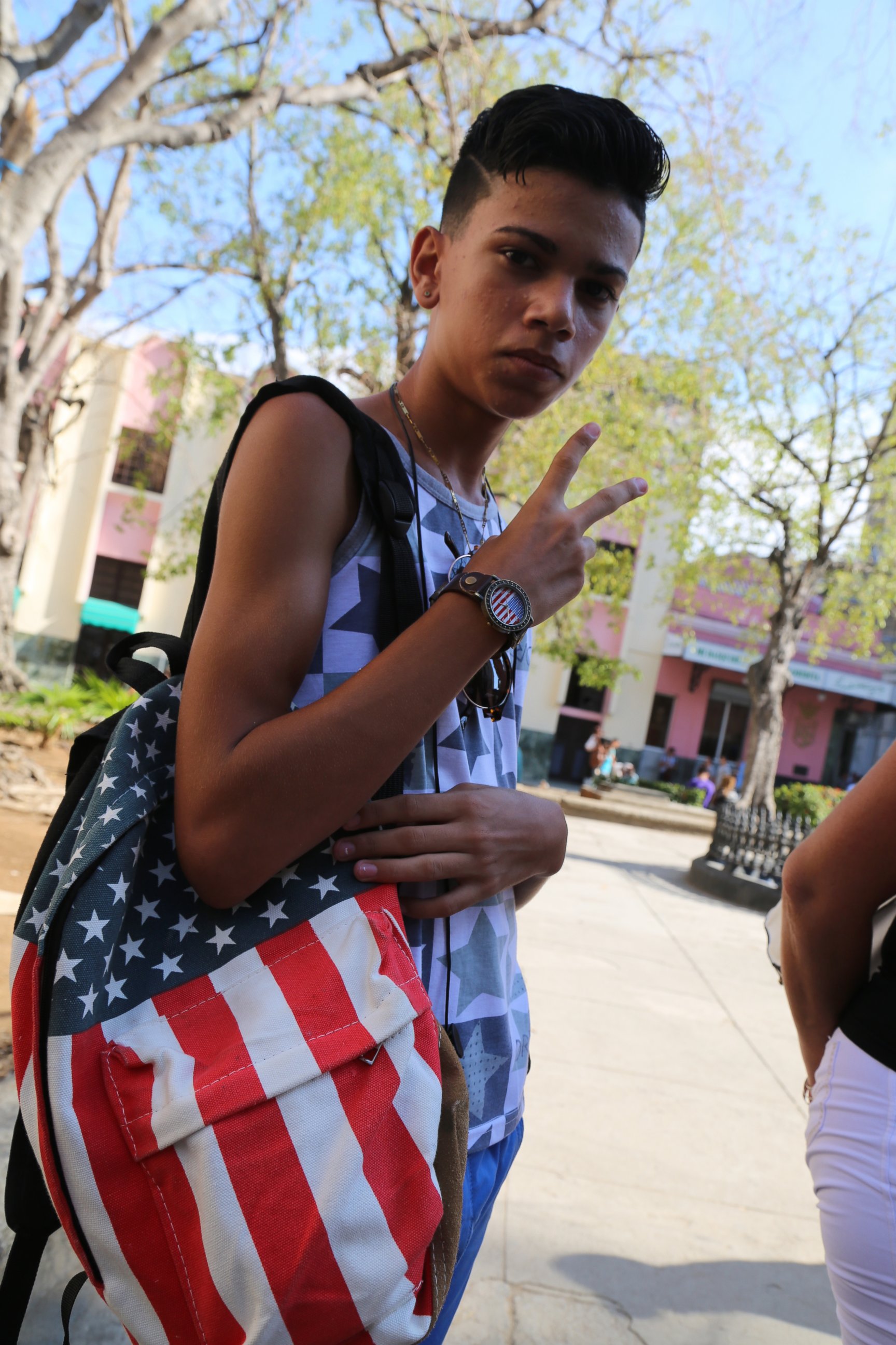 PHOTO: A Cuban youth flaunts his American red, white and blue decorative wear in Cuba on August 12, 2015. 