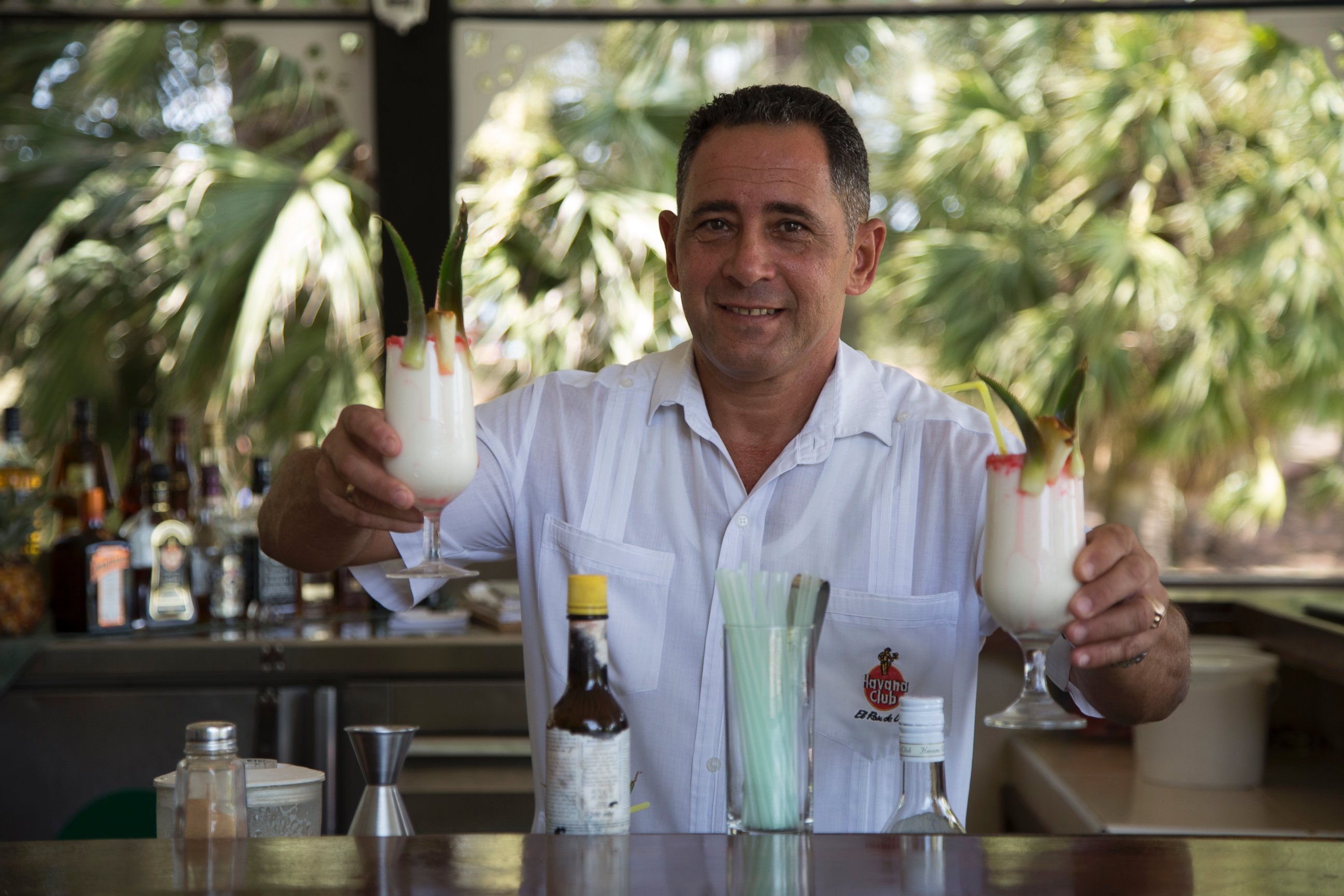 PHOTO: Juan Miguel, Elian's father, serves up Pina Coladas at his job as a bartender - the same job he had before the US/Cuba custody battle.