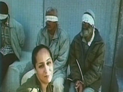 Video: Solider post pictures with Palestinian prisoners.