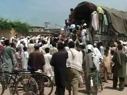 Extremist Groups Offer Aid to Flood Survivors