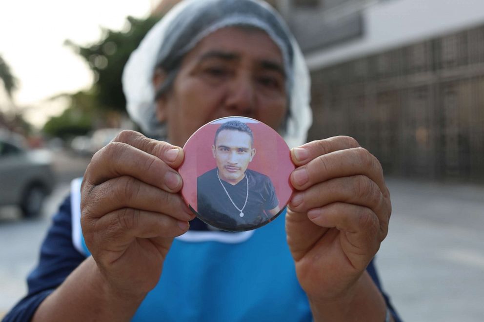 In the state of Guerrero, mothers were wearing placards of their missing children around their necks as they searched the rugged terrain for remains.