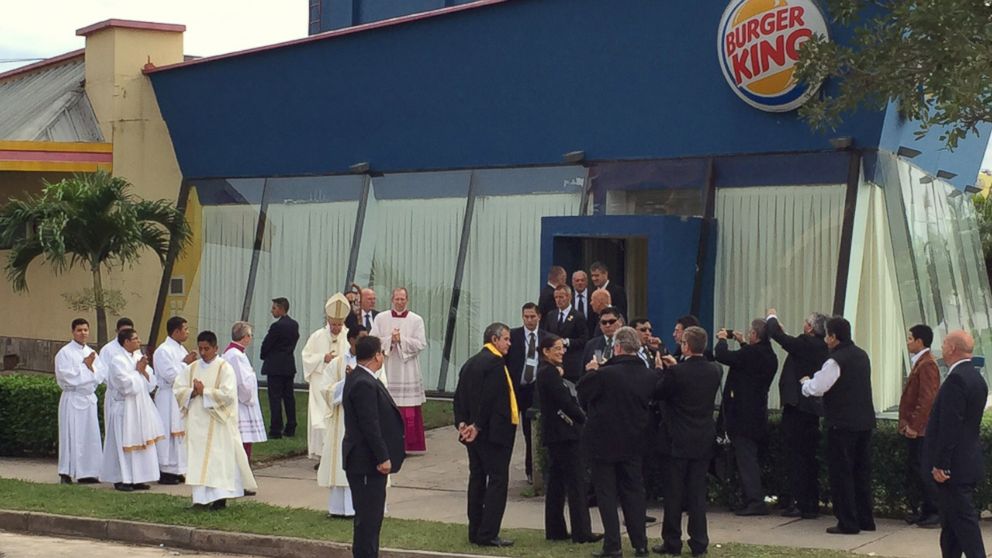 Pope Francis stands outside the Burger King franchise that served as a makeshift sacristy for today's open air mass in Santa Cruz, Bolivia.