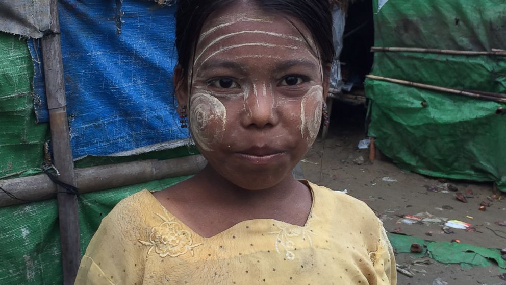 PHOTO: A young Rohingya girl living in a refugee camp outside of Sittwe, Myanmar, wears Thanakha on her face to protect her skin.