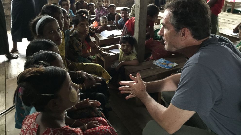 PHOTO: ABC News' Bob Woodruff speaking with young children inside the refugee camps outside of Sittwe, Myanmar.