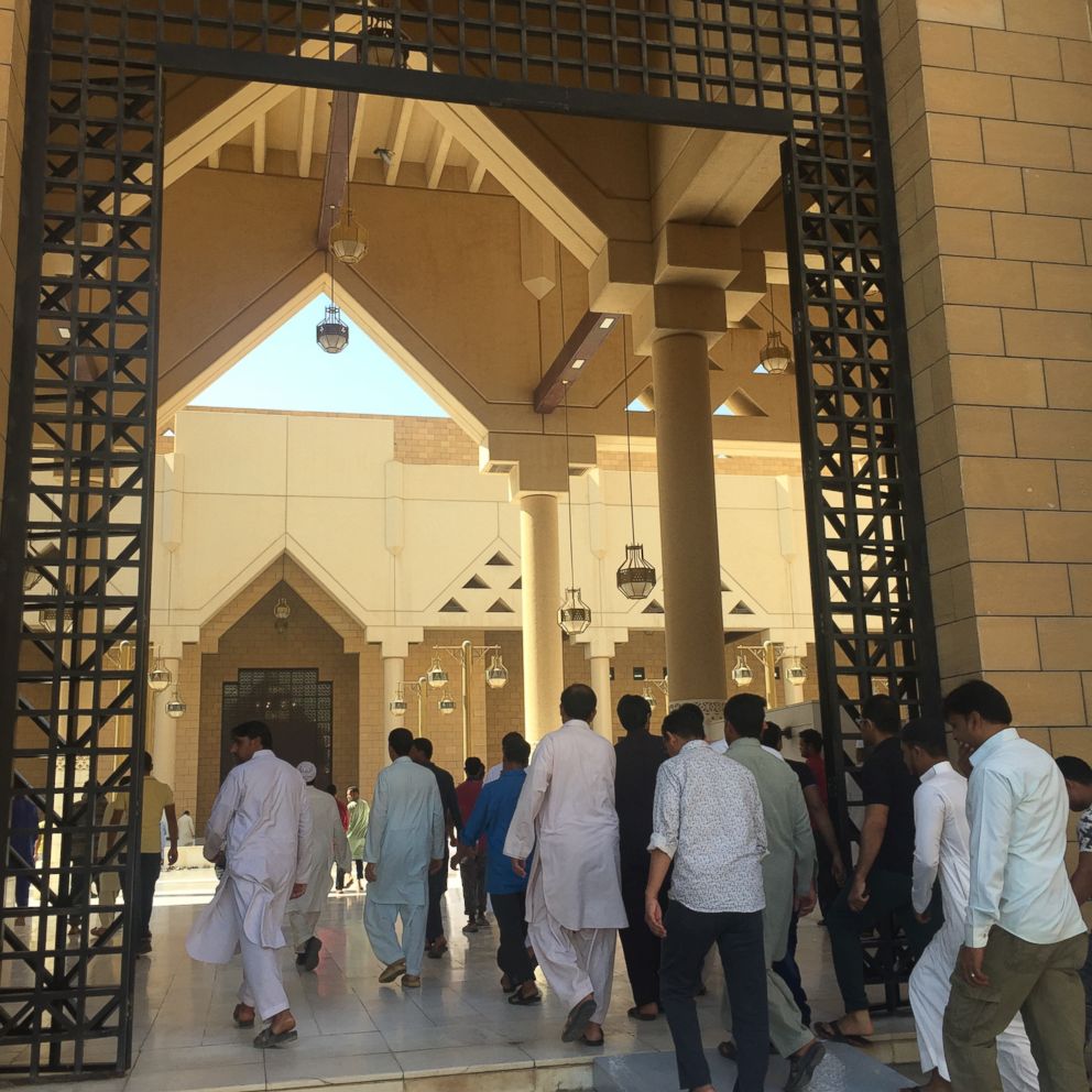 Men stream into the Grand Mosque in Riyadh for Friday Prayers.