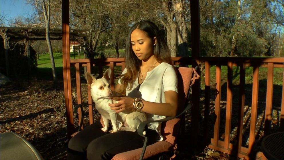 Sokha Chan, 22, is shown here with her dog during an interview with ABC News "Nightline."
