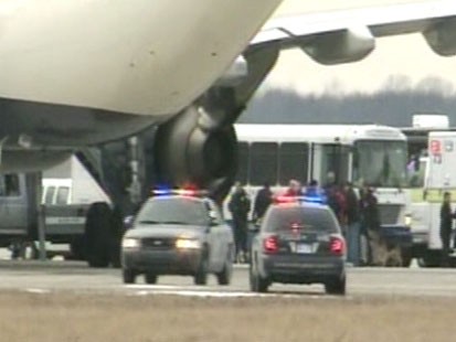 VIDEO: An "unruly passenger" is being held after incident on a Detroit bound plane.