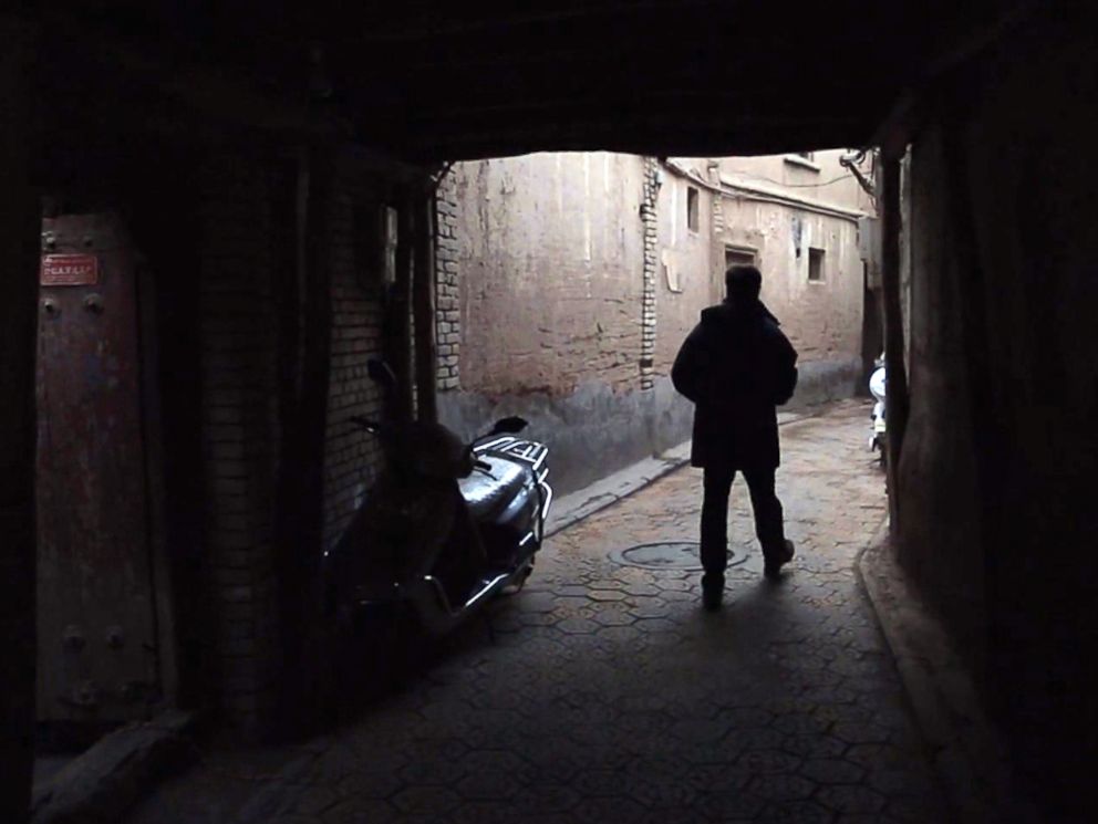 PHOTO: ABC News Bob Woodruff walks through a small neighborhood in the Old City of Kashgar, China in December 2015.