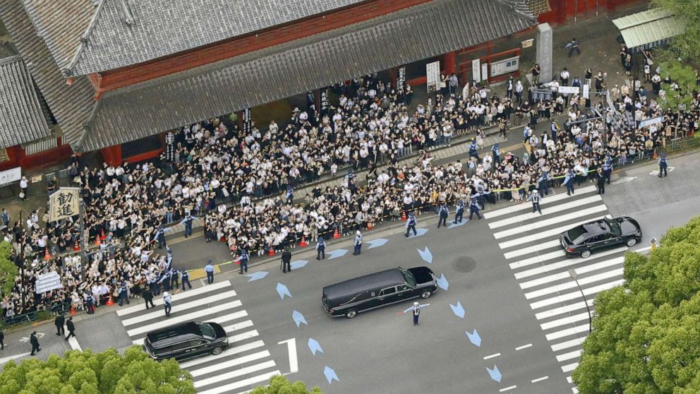 PHOTO: An aerial view shows motorcade carrying the body of the late former Japanese Prime Minister Shinzo Abe, leave after his funeral at Zojoji Temple in Tokyo, Japan, on July 12, 2022.