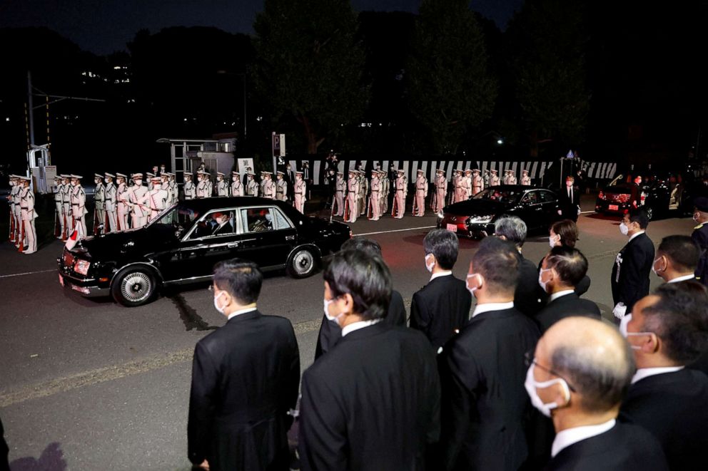 PHOTO: A vehicle carrying the remains of former Prime Minister Shinzo Abe leaves a state funeral at the Nippon Budokan in Tokyo, Japan, Sept. 27, 2022. 