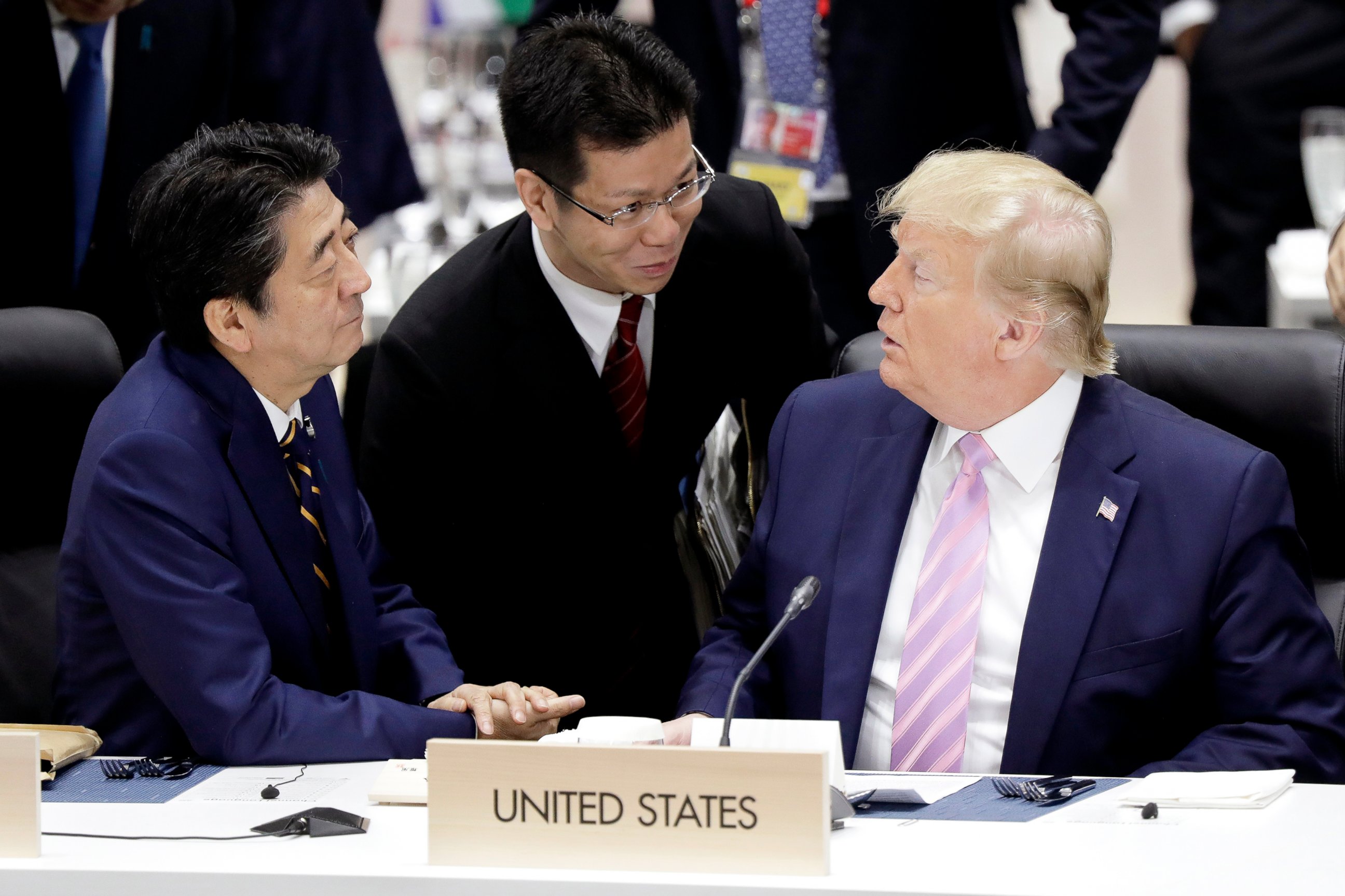 PHOTO: Japan's Prime Minister Shinzo Abe, left, and U.S. President Donald Trump, right, talk prior to a working lunch at the Group of 20 (G-20) summit in Osaka, western Japan, Friday, June 28, 2019.