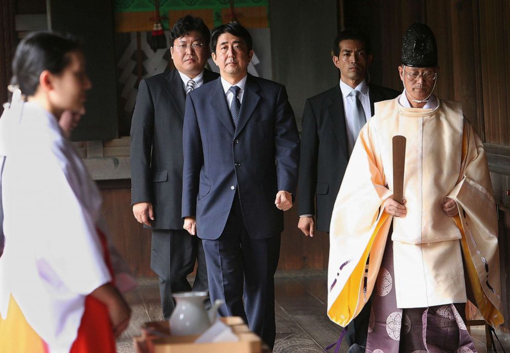 PHOTO: Shinzo Abe, center visits Yasukuni Shrine, which is dedicated to the war dead including Class-A war criminals, August 15, 2005, in Tokyo as the country marked the 60th anniversary of its World War II surrender.