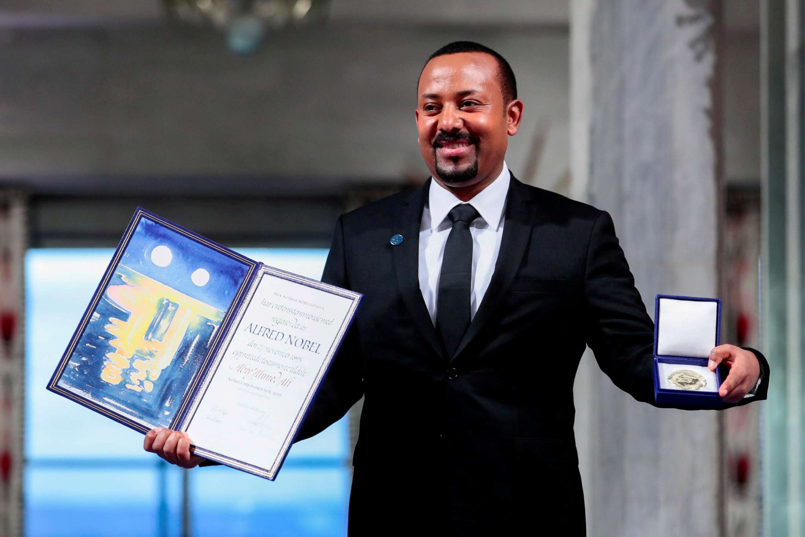 PHOTO: Ethiopian Prime Minister Abiy Ahmed Ali poses with medal and diploma after receiving Nobel Peace Prize during ceremony in Oslo City Hall, Norway, Dec. 10, 2019.