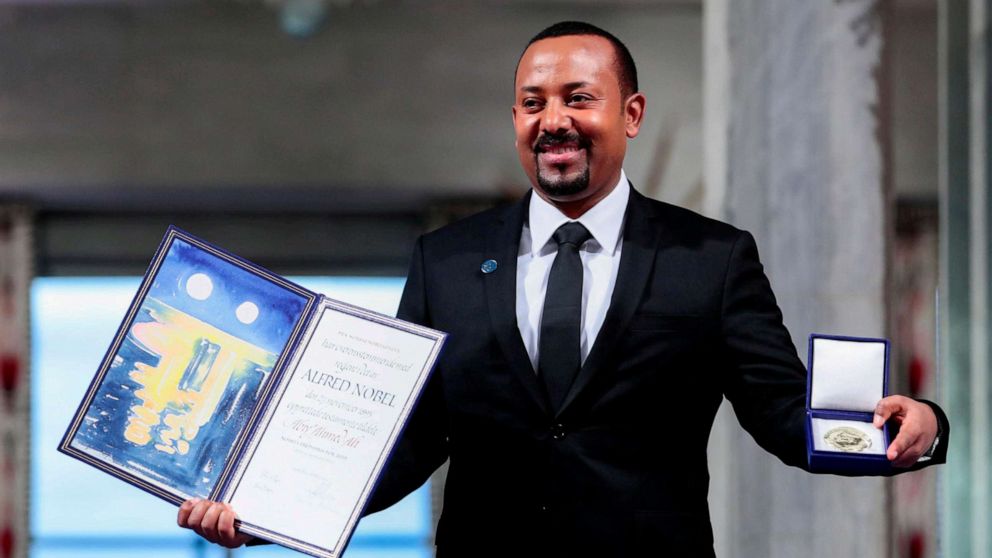 PHOTO: Ethiopian Prime Minister Abiy Ahmed Ali poses with medal and diploma after receiving Nobel Peace Prize during ceremony in Oslo City Hall, Norway, Dec. 10, 2019.
