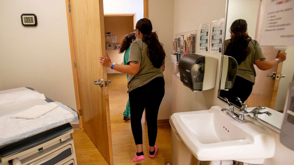 PHOTO: A 25-year-old woman leaves the exam room after receiving medication to terminate her pregnancy in Albuquerque, N.M., June 23, 2022.