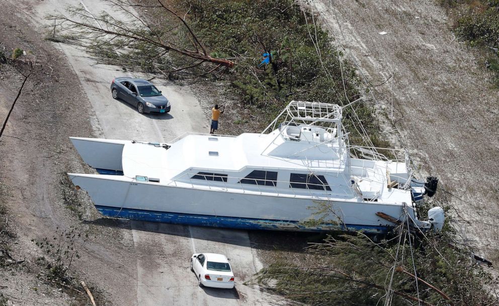 PHOTO: A boat tossed into the middle of a roadway after hurricane Dorian hit the Grand Bahama Island in the Bahamas, Sept. 4, 2019.