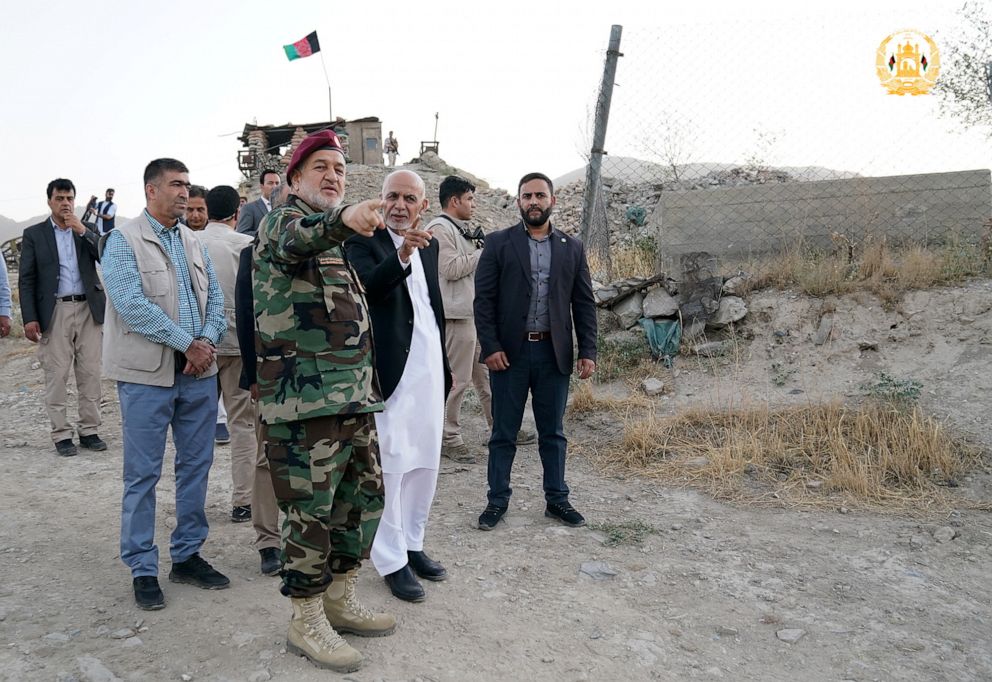 PHOTO: Afghanistan's President Ashraf Ghani and acting defence minister Bismillah Khan Mohammadi visit  military corps in Kabul, Afghanistan, Aug. 14, 2021.