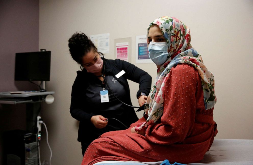 PHOTO: Susan Mohammadi has her blood pressure taken during an OBGYN appointment in Sacramento, Calif., Dec. 28, 2021.