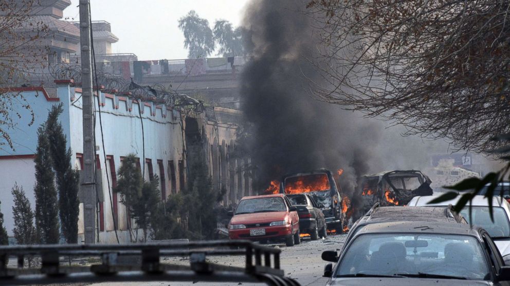 PHOTO: Vehicles burn after a deadly attack in Jalalabad, Afghanistan, Jan. 24, 2018