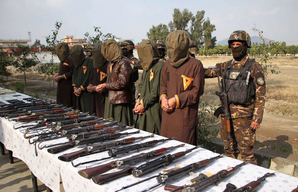 PHOTO: Afghanistan's National Directorate Security (NDS) escort a group of suspected militants who are accused of planning attacks on government and security forces after their arrest in Jalalabad, Afghanistan, Jan. 23, 2019.