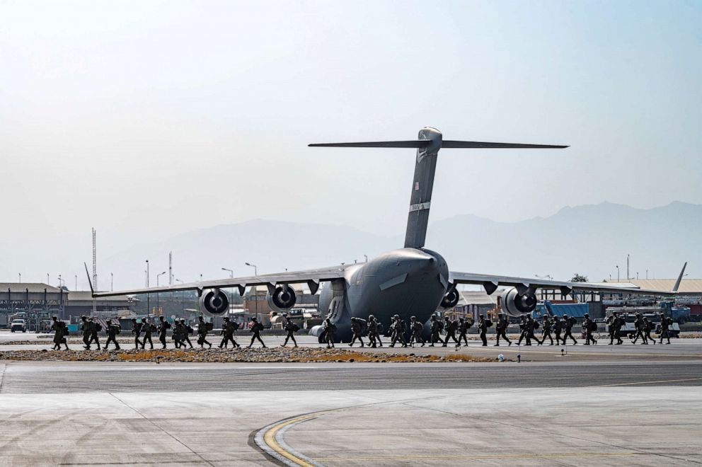 PHOTO: U.S. soldiers arrive to provide security in support of Operation Allies Refuge at Hamid Karzai International Airport in Kabul, Afghanistan, Aug. 20, 2021.