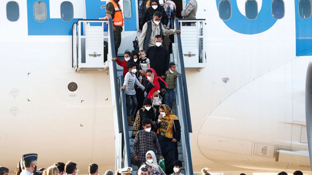 PHOTO: Spanish diplomatic, security staff and Afghan citizens evacuated from Kabul arrive at Torrejon Air Base, after Spain officially ended its evacuation mission in Afghanistan, Aug. 27, 2021, in Torrejon de Ardoz, outside Madrid.