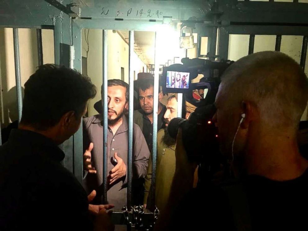 PHOTO: ABC News Senior Foreign Correspondent Ian Pannell and photographer James Gillings interview imprisoned Taliban fighters outside Kabul, Afghanistan, in June 2018.