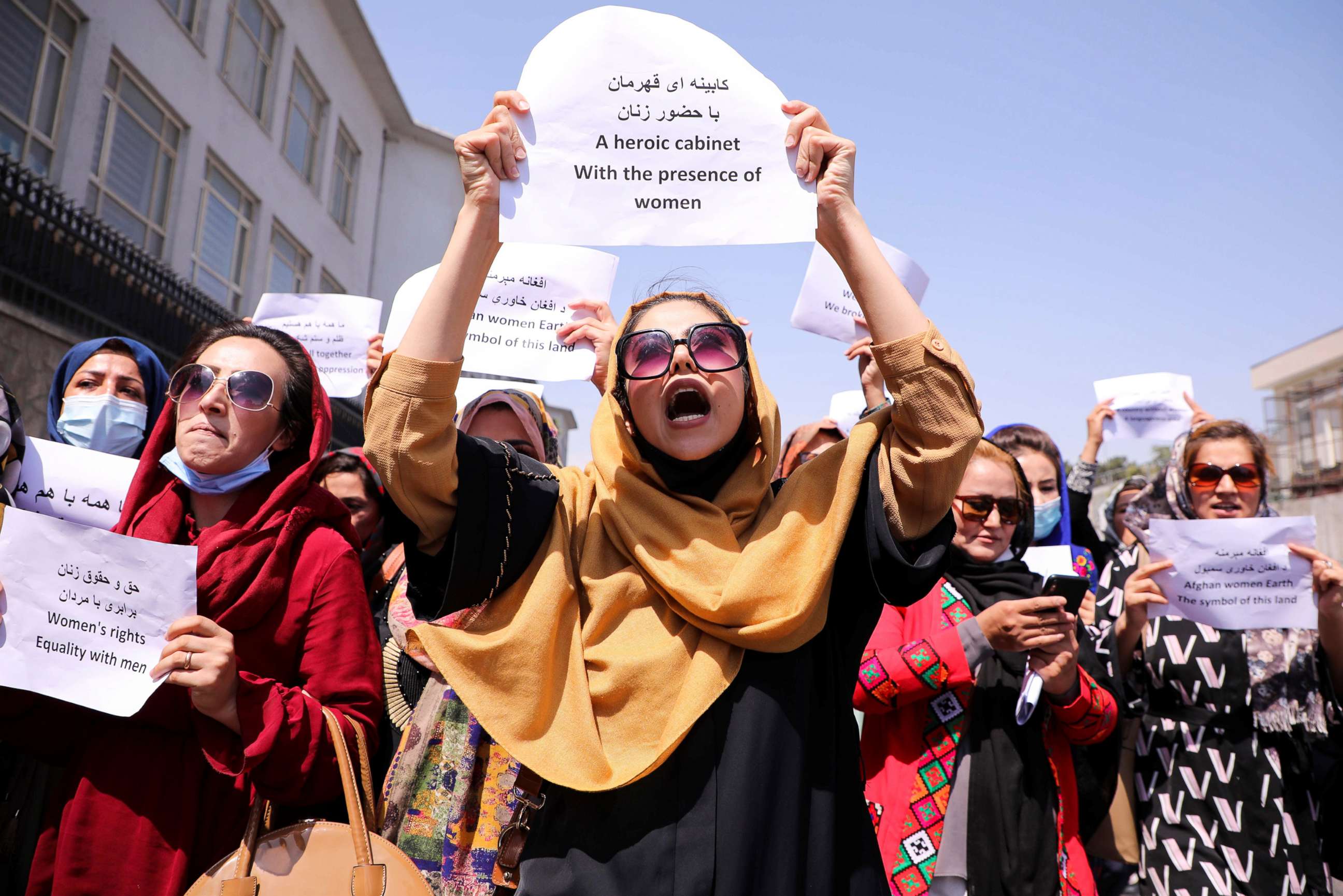 PHOTO: Afghan women's rights defenders and civil activists protest to call on the Taliban for the preservation of their achievements and education, in front of the presidential palace in Kabul, Afghanistan Sept. 3, 2021.