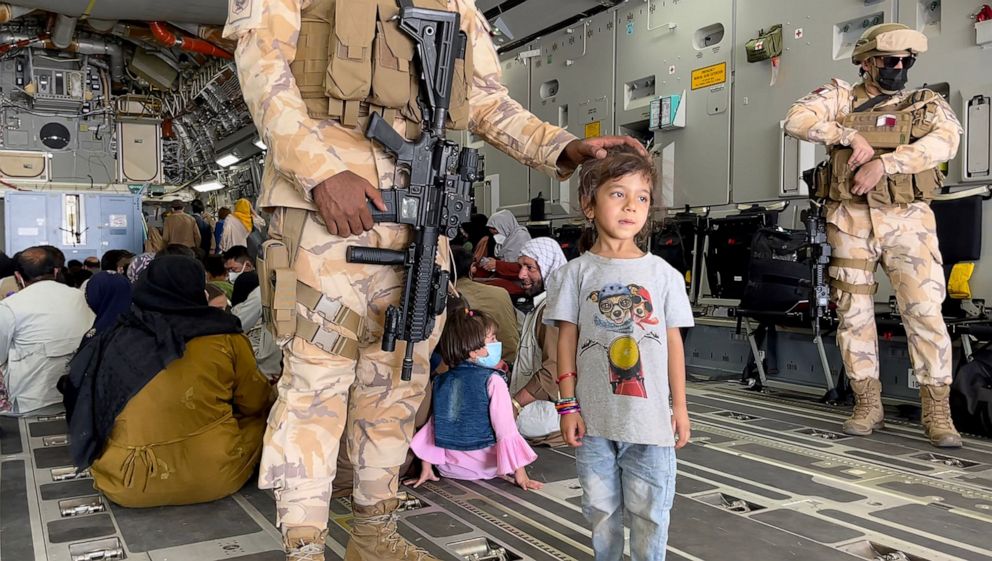 PHOTO: Refugees are evacuated from Hamid Karzai International Airport in Kabul, Afghanistan on, Aug. 26, 2021.