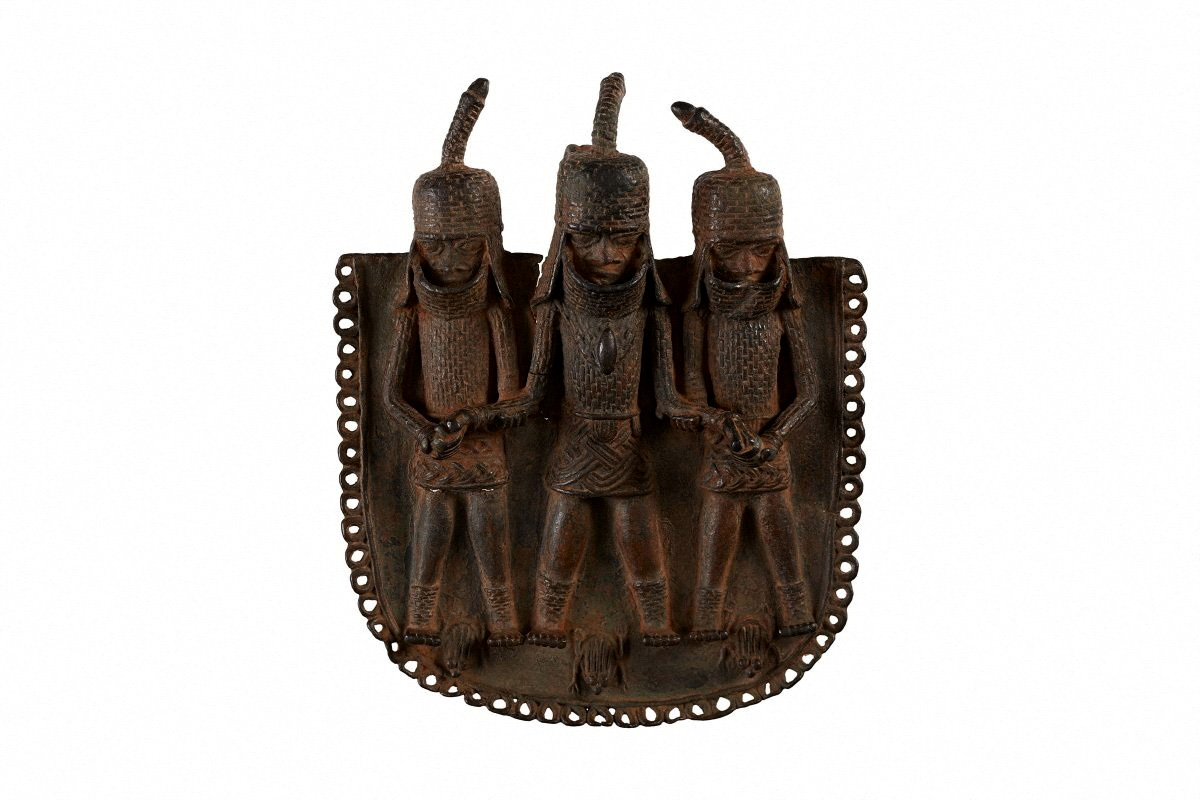 PHOTO: A square bronze pendant or ornament, one of the objects that London's Horniman Museum says was looted from Benin City by British soldiers in 1897 and will be returned to Nigeria's government.