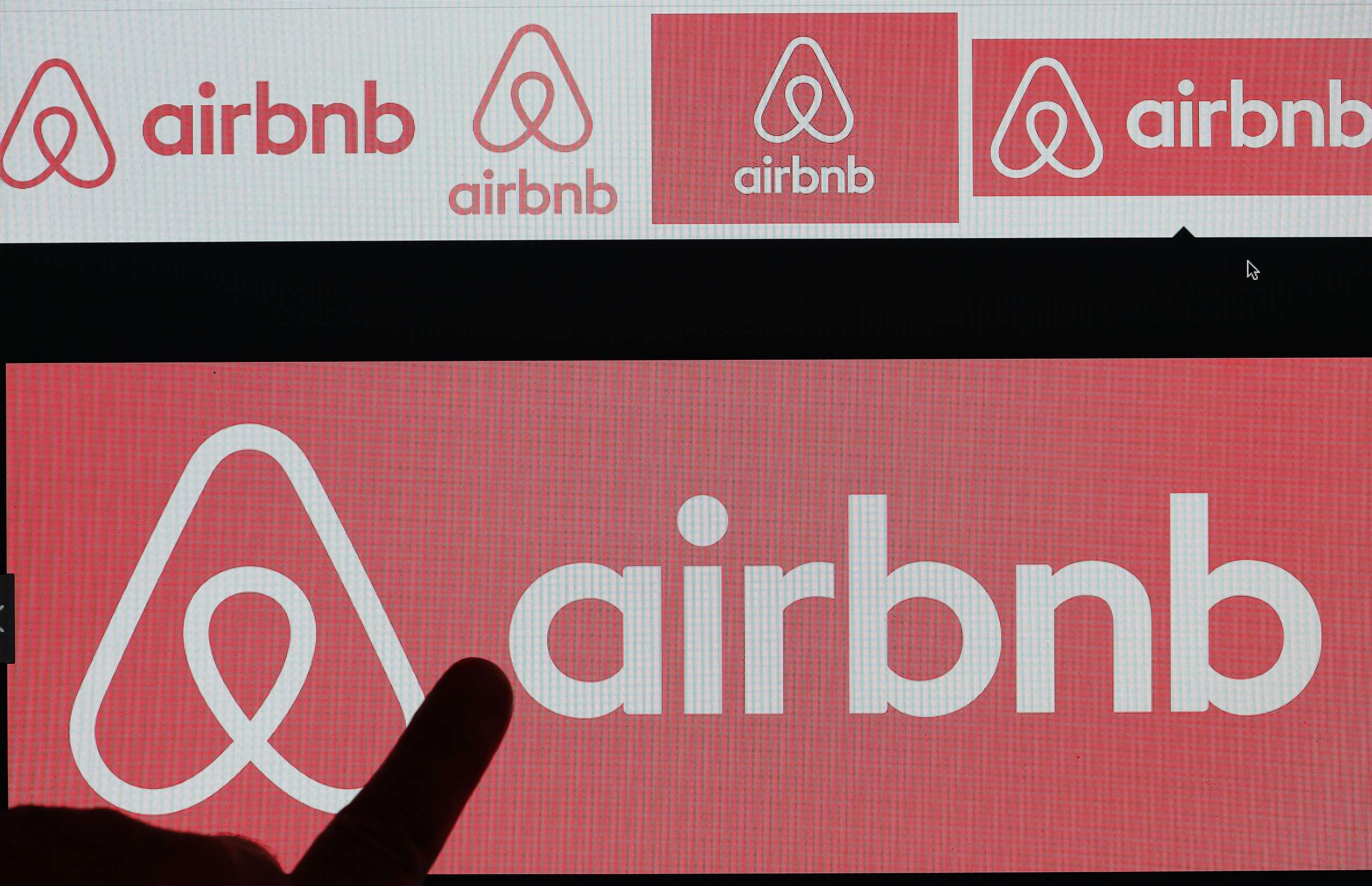 PHOTO: The Airbnb logo is displayed on a laptop screen on Dec. 11, 2017 in Paris.