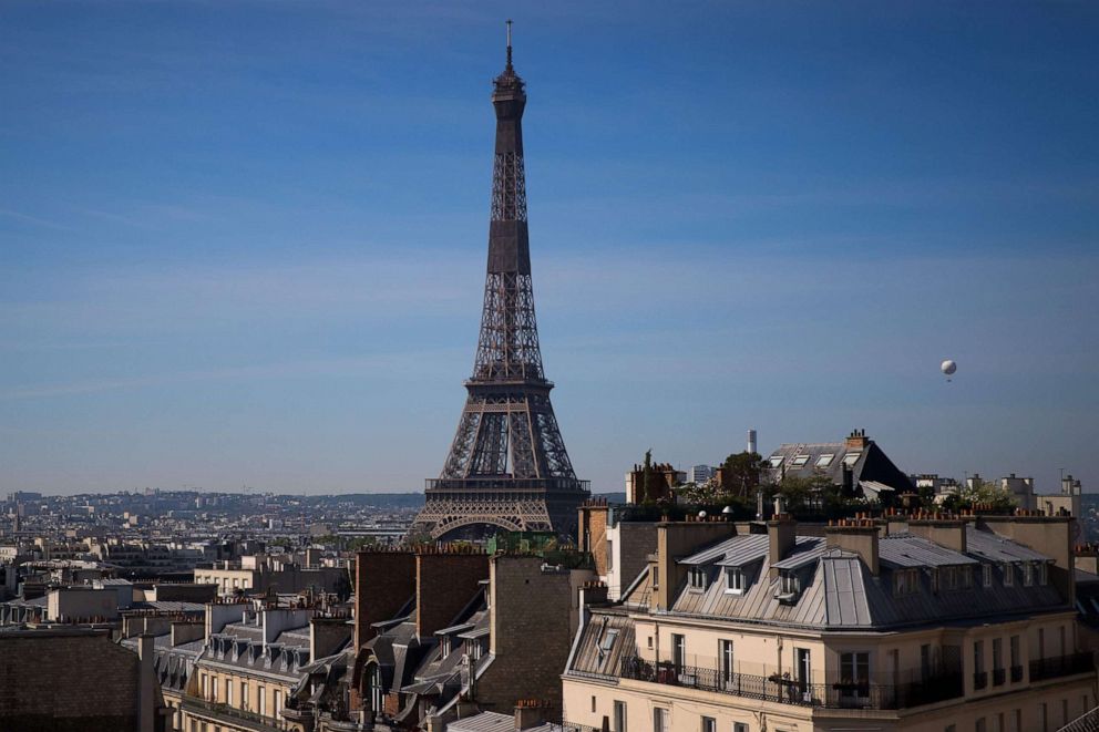 PHOTO: The weather balloon of Airparif, the organization responsible for monitoring the air quality in the Ile de France region, flies next to the Eiffel Tower in Paris on May 7, 2020.