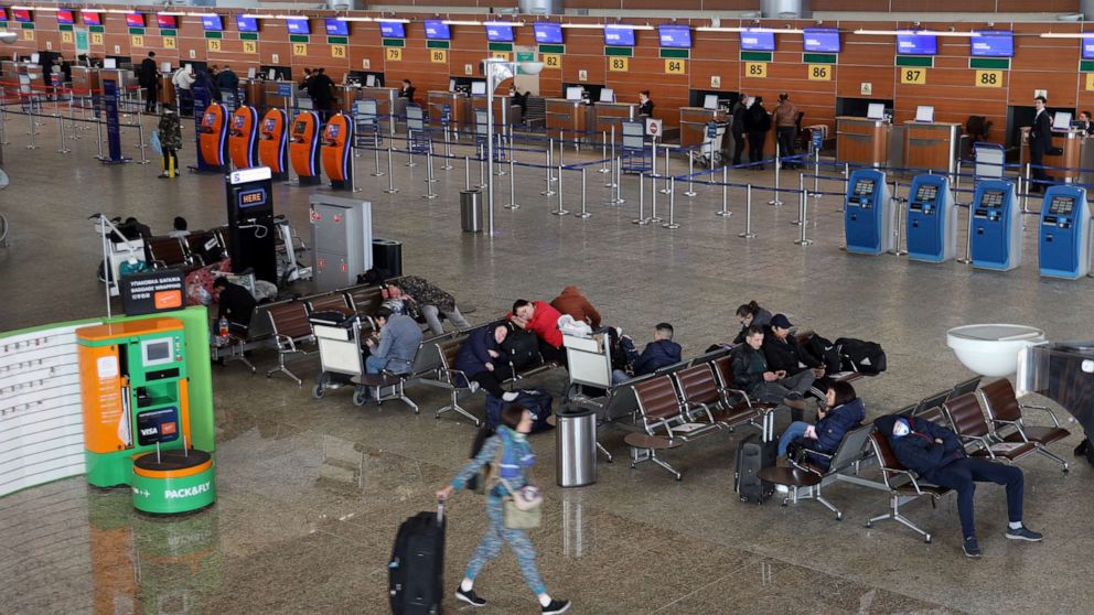 Passengers at Sheremetyevo International Airport on the first day of an international flight ban ordered by the government amid the ongoing COVID-19 pandemic and effective since March 27.Marina Lystseva/TASS/Newscom