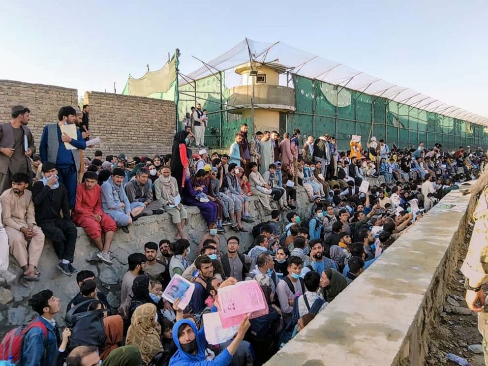 PHOTO: Crowds of people wait outside the airport in Kabul, Afghanistan, Aug. 25, 2021. in this picture obtained from social media.