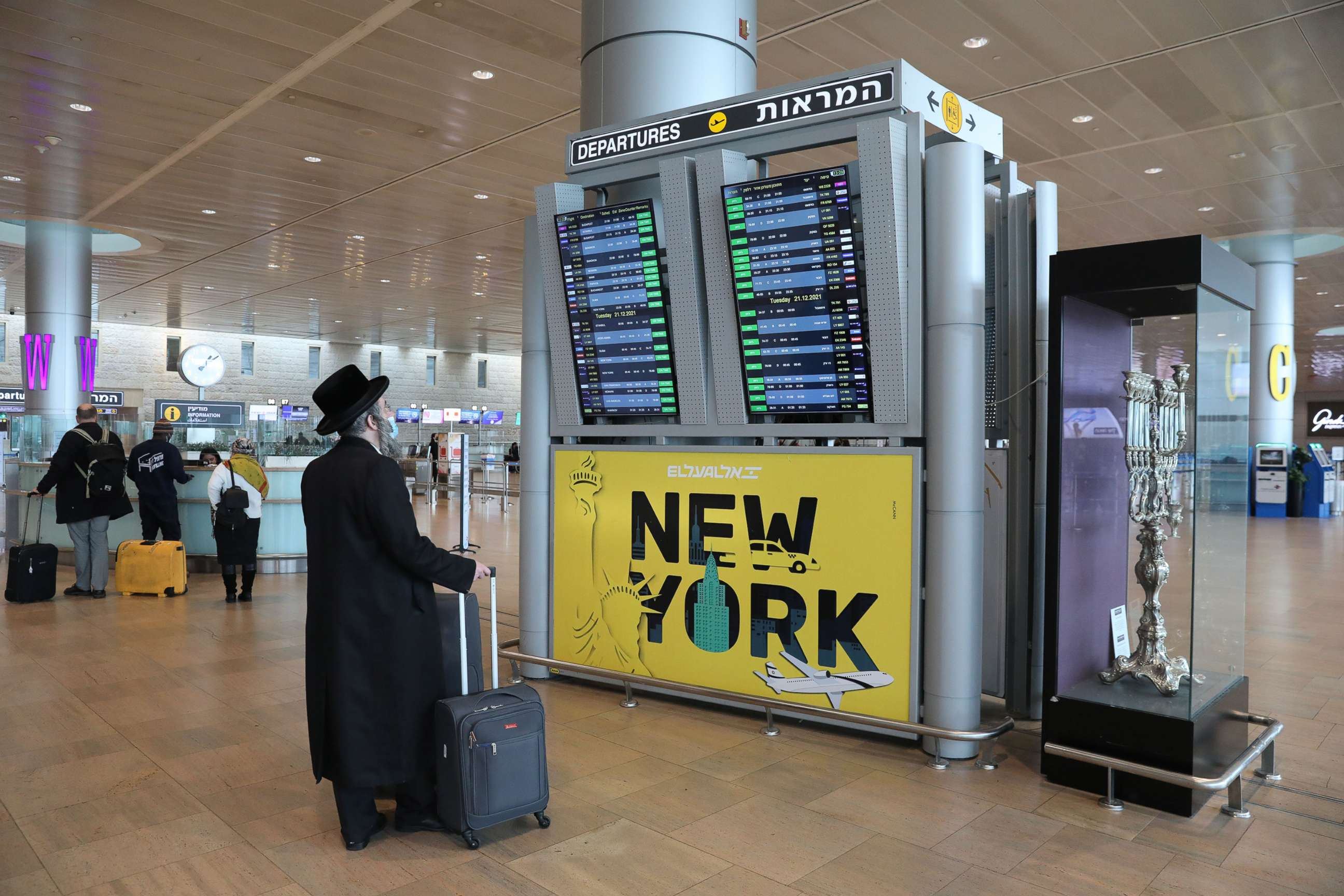 PHOTO: An ultra Orthodox Jewish passenger looks at the departures board at the Ben Gurion International Airport near Tel Aviv, Israel, Dec. 20, 2021.