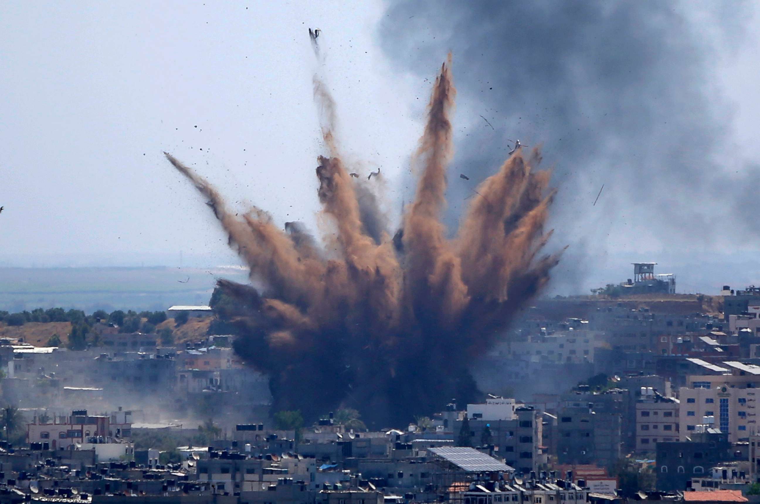 PHOTO: Smoke rises following Israeli airstrikes on a building in Gaza City, May 13, 2021.