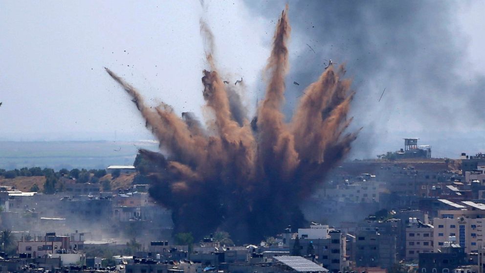 PHOTO: Smoke rises following Israeli airstrikes on a building in Gaza City, May 13, 2021.