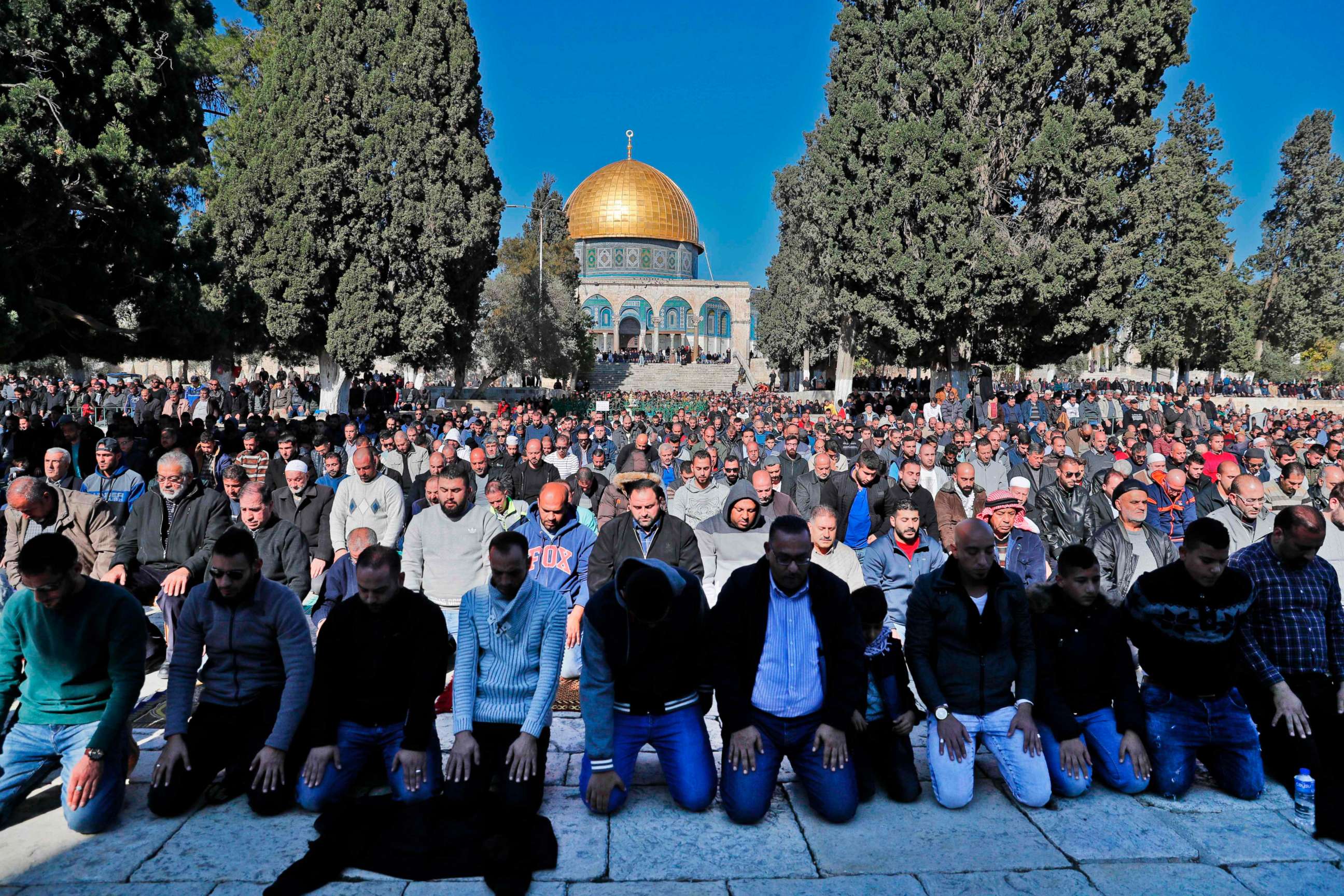 PHOTO: Palestinian Muslim worshipers pray in front of the Dome of the Rock mosque at the al-Aqsa mosque compound in the Jerusalem's Old City, Dec. 8, 2017. 
