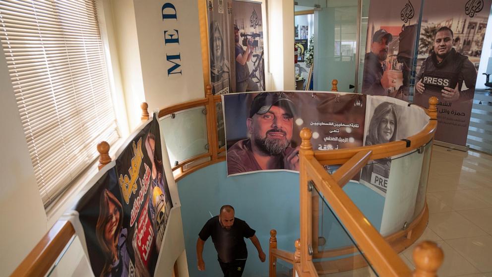 PHOTO: Al Jazeera cameraman Zaid Aqrat works at his network's office in the West Bank city of Ramallah Sunday, May 5, 2024.