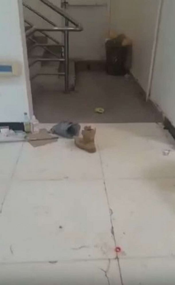 PHOTO: A discarded military boot is seen in the corridors of the ransacked Al Raqi Hospital in Khartoum, Sudan, on April 21, 2023, in this still from a video sent to ABC News by Dr. Mohamed Karrar.