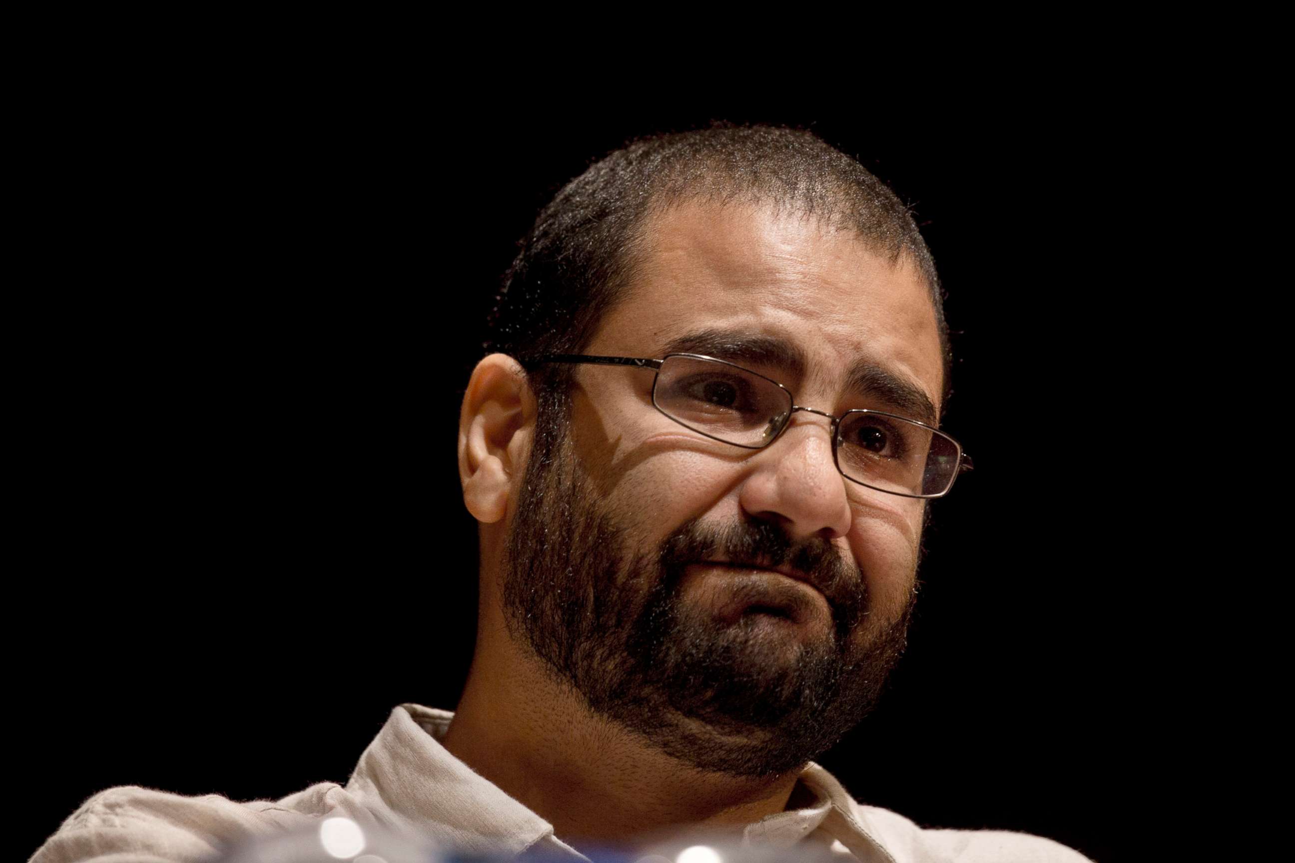 PHOTO: Egypt's leading pro-democracy activist Alaa Abdel-Fattah speaks during a conference at the American University in Cairo, Sept. 22, 2014. The family says he began a "full hunger strike" and plans to stop drinking water the first day of COP27. 