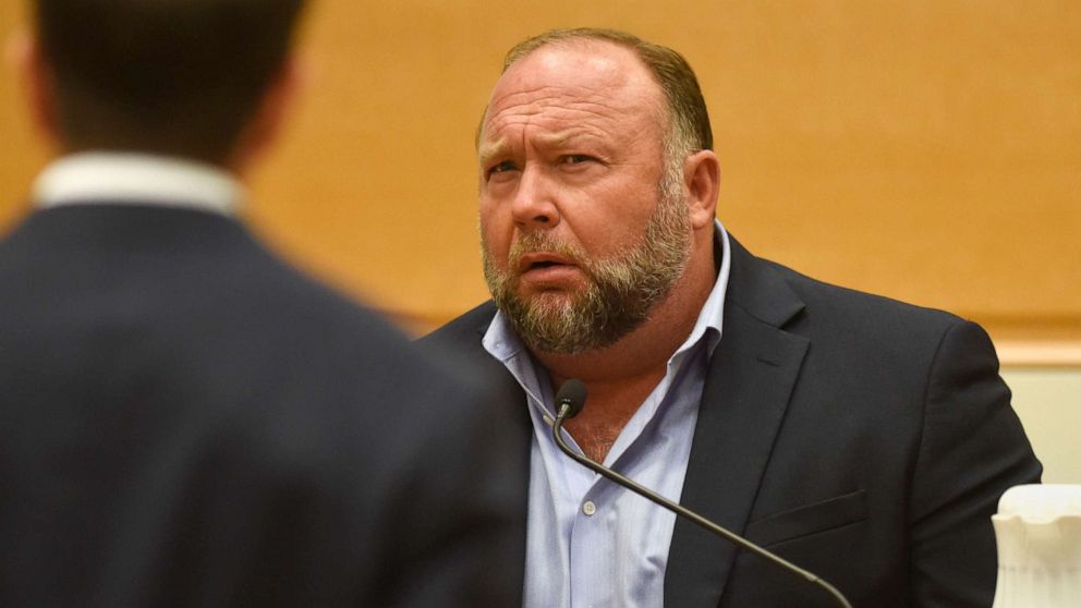 PHOTO: Infowars founder Alex Jones is questioned by plaintiff's attorney Chris Mattei during testimony at the Sandy Hook defamation damages trial at Connecticut Superior Court in Waterbury, Conn., Sept. 22, 2022. 