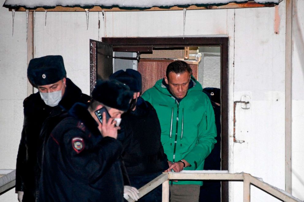 PHOTO: Opposition leader Alexei Navalny is escorted out of a police station in Khimki, Russian, Jan. 18, 2021.