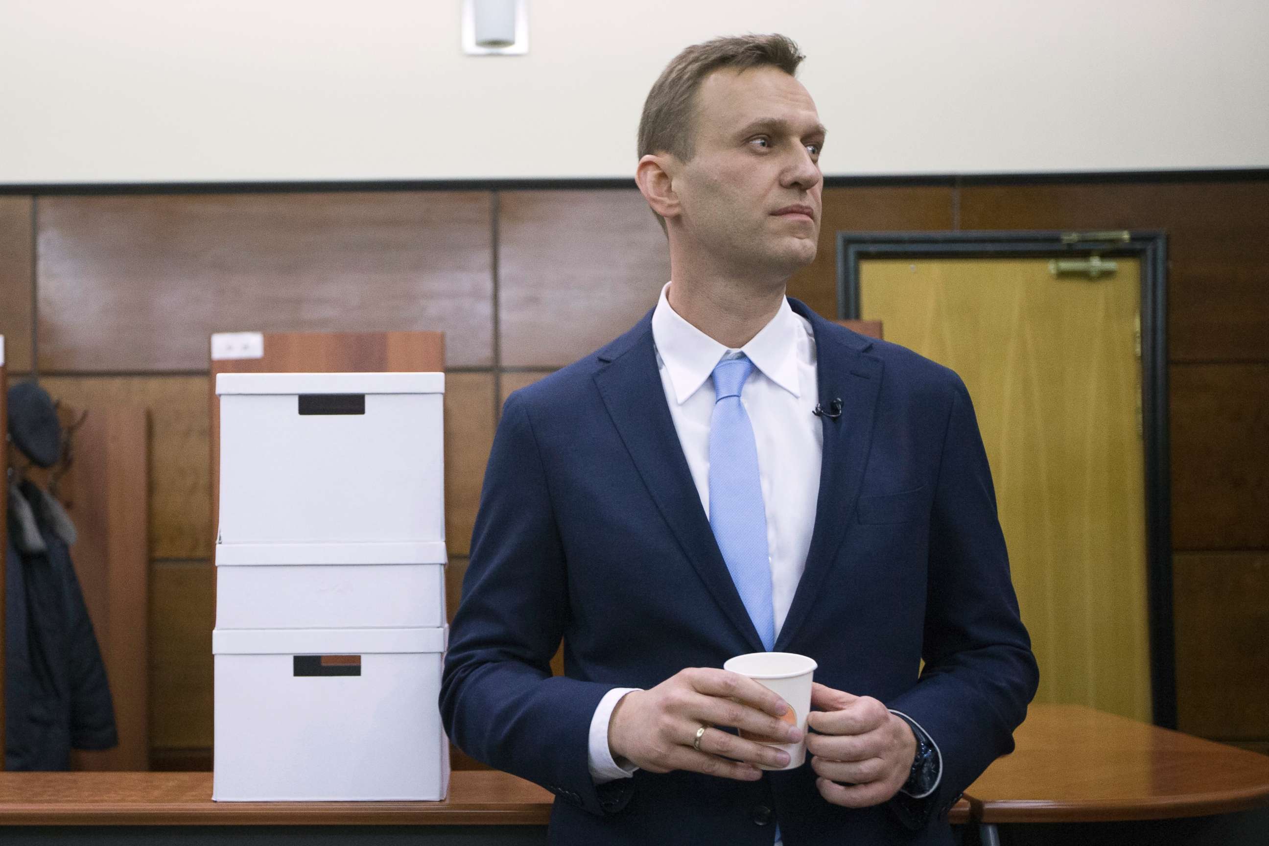 PHOTO: Russian opposition leader Alexei Navalny rests next to boxes with endorsement papers in support of his presidential bid to Russia's Central Election in Moscow, Dec. 24, 2017.