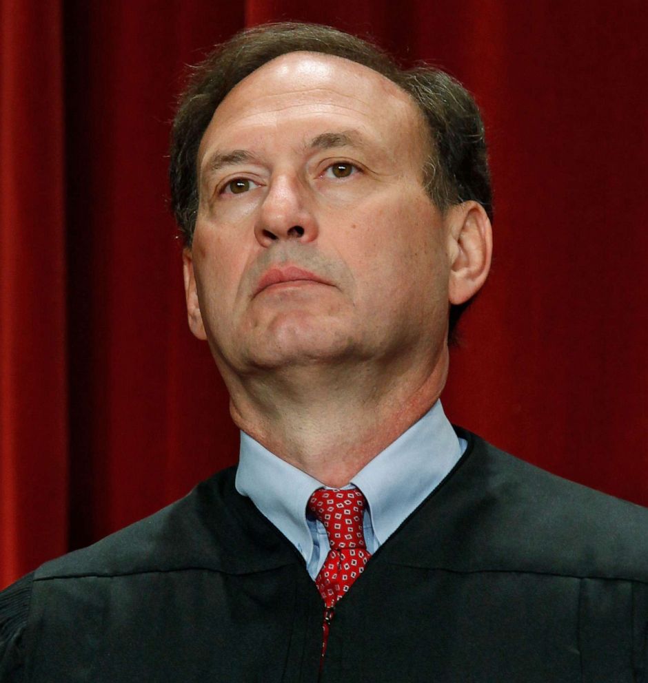 PHOTO: Associate Justice Samuel Alito Jr. poses for a group photograph at the U.S. Supreme Court building on Sept. 29, 2009 in Washington.