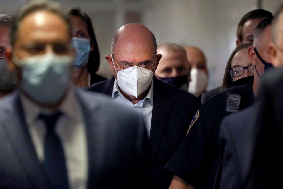 PHOTO: Trump Organization finance chief Allen Weisselberg leaves a New York court after surrendering to authorities in New York, July 1, 2021.