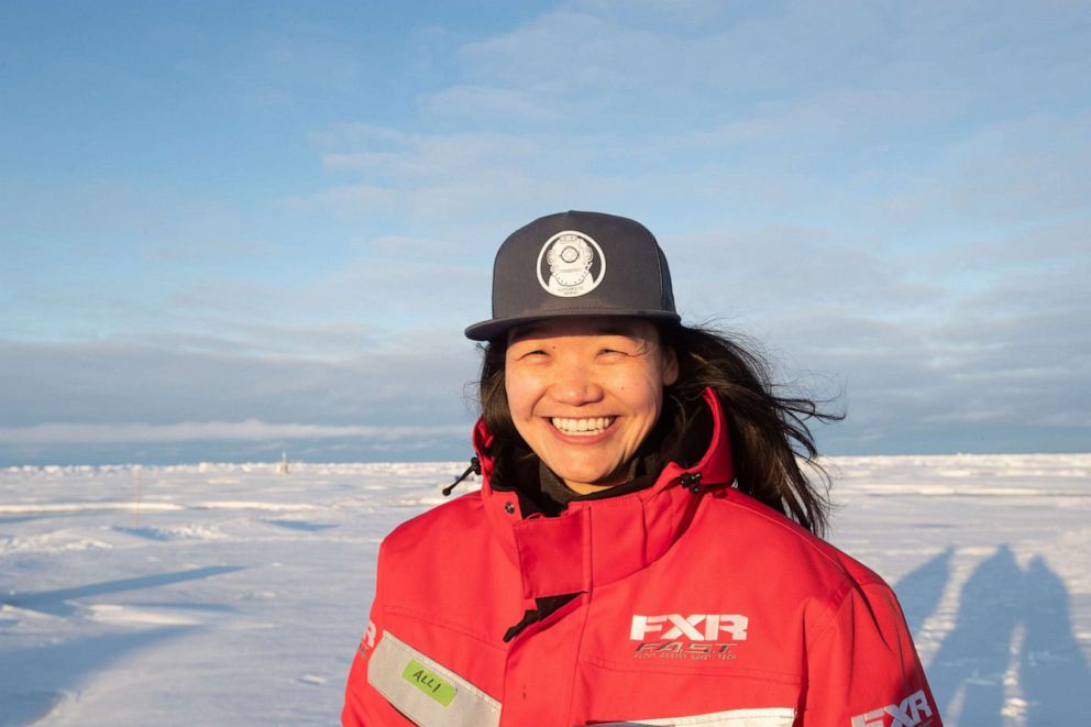 PHOTO: Dr. Allison Fong stands on the Arctic ice during the MOSAiC expedition.