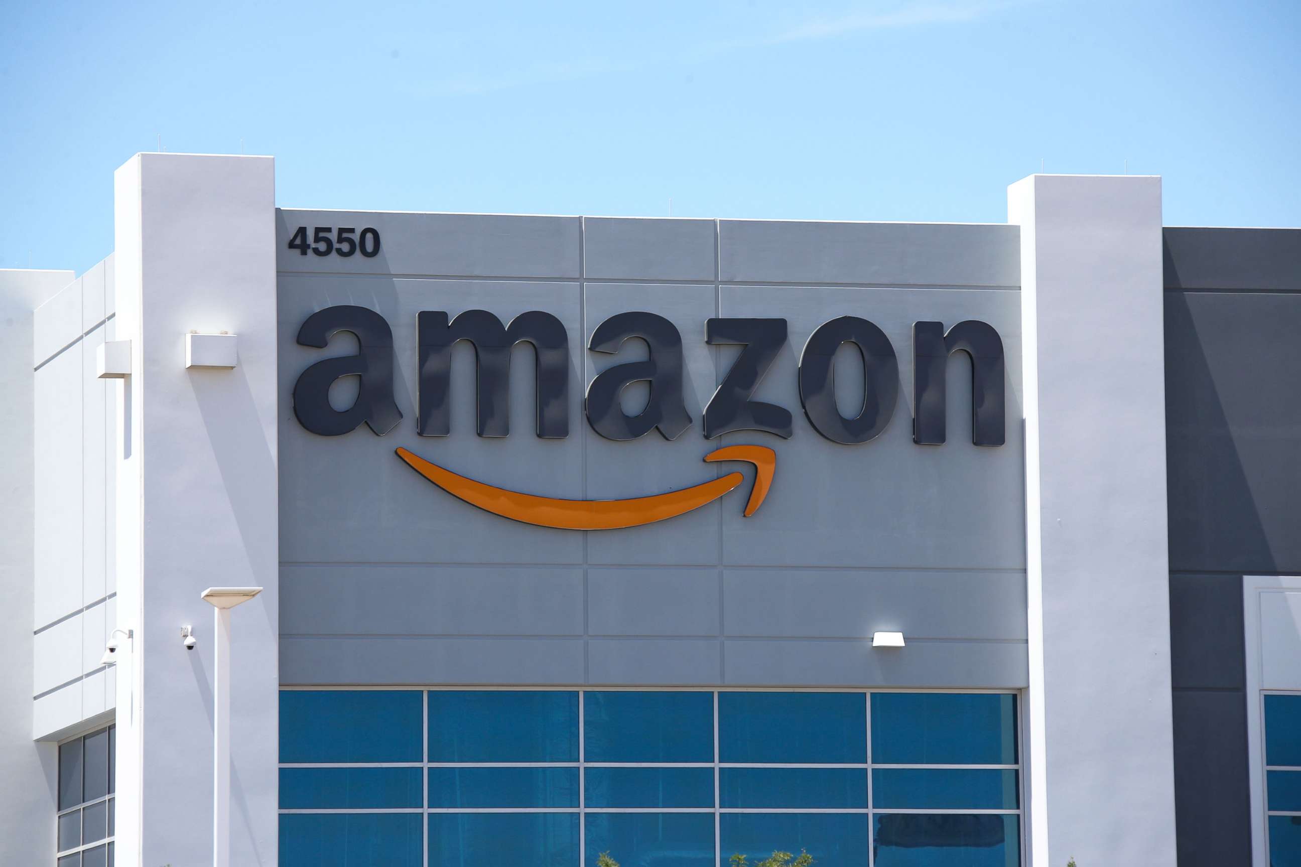 PHOTO: In this May 30, 2022, file photo, an Amazon logo is displayed on a fulfillment center in Las Vegas.