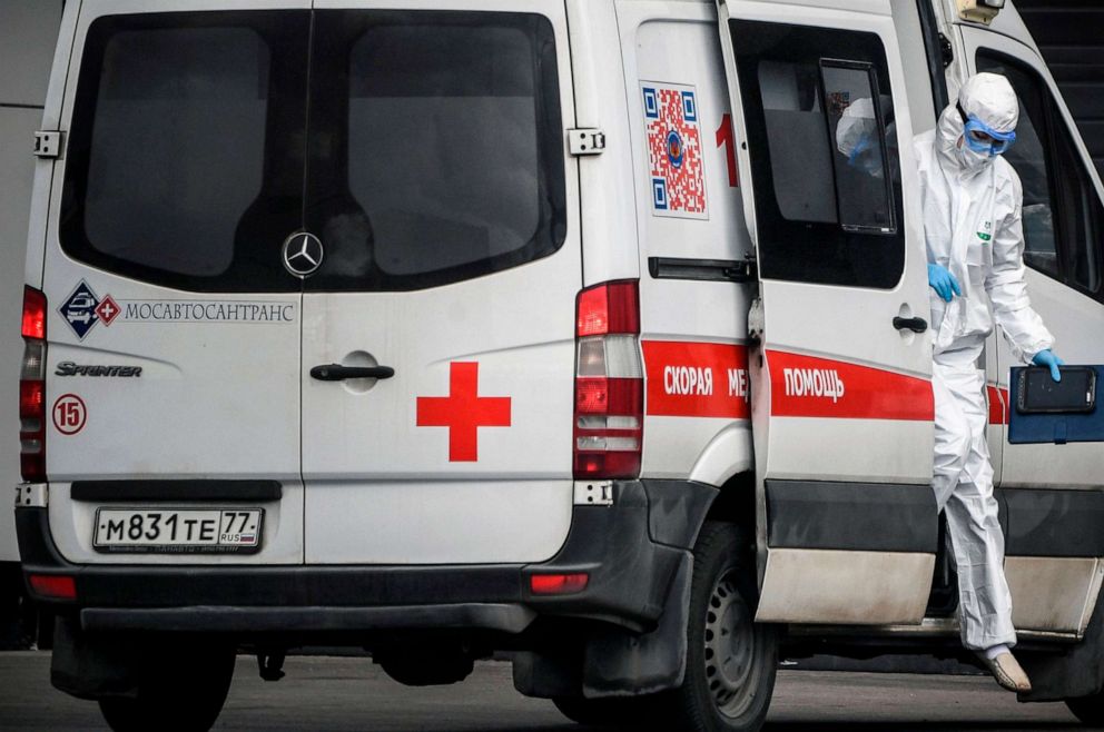PHOTO: A medic gets out from an ambulance at a hospital where patients infected with the novel coronavirus are being treated in the settlement of Kommunarka, outside Moscow, Russia, on April 28, 2020.